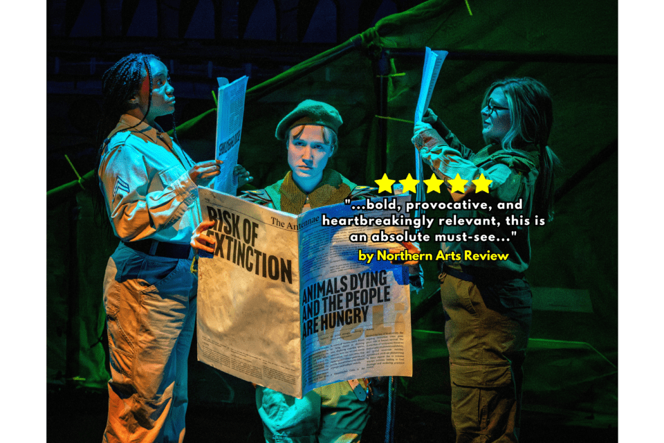 Actors in paramilitary costuming read newspapers on the set of "The Intrusion" at Leeds Playhouse