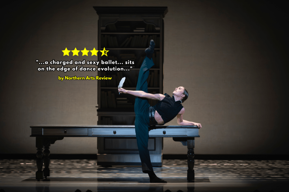 Northern Ballet dancer portraying Anne Lister lifts a leg in front of a table at Leeds Grand Theatre